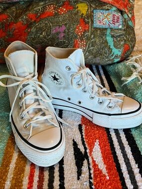 Converse White High Top Sneakers with Black Stripe